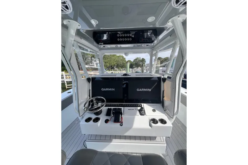 Slide: The Image of Interior of 2025 Freeman 42 LR boat with Garmin navigation system and modern controls. - 40