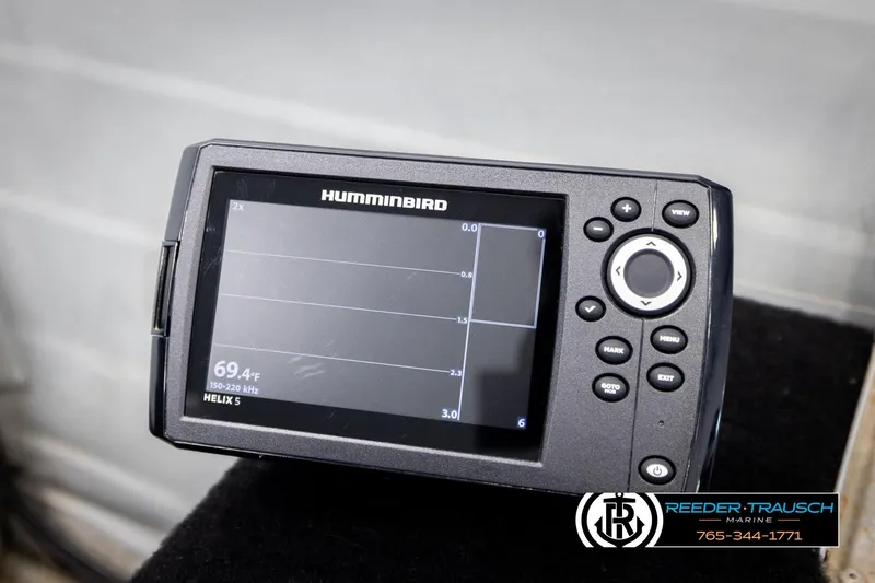 Slide: The Image of Humminbird Helix 5 fish finder on a 1993 Sylvan 14 VFO boat dashboard. - 21