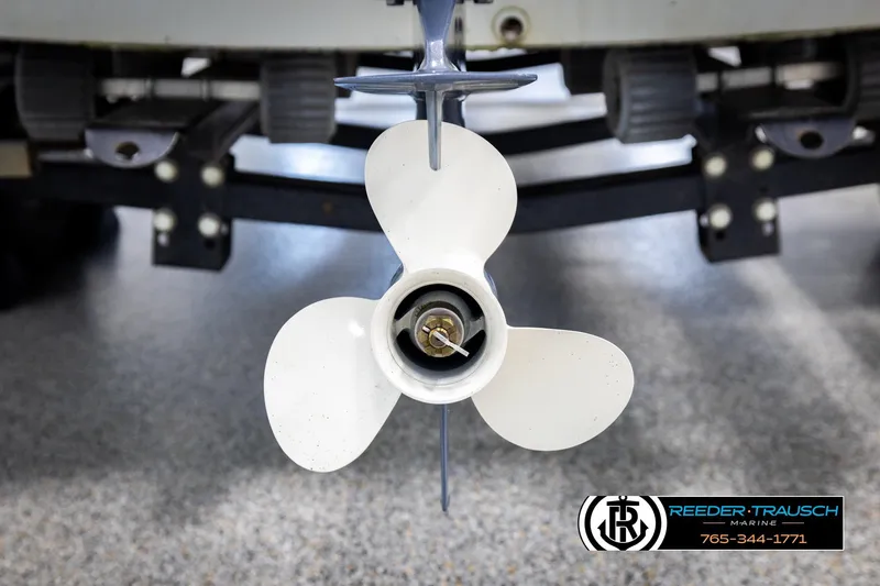Slide: The Image of 1993 Sylvan 14 VFO boat propeller with Reeder-Trausch Marine logo in background. - 33