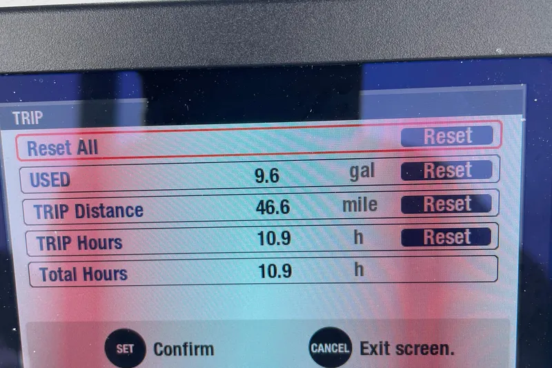 Slide: The Image of Display screen showing trip data: 9.6 gallons used, 46.6 miles, 10.9 hours on Zodiac Pro 5.5. - 11