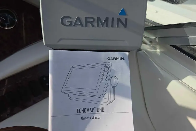 Slide: The Image of Garmin ECHOMAP UHD owner's manual on Sea Ray 280 Bow Rider, 1999 model. - 8