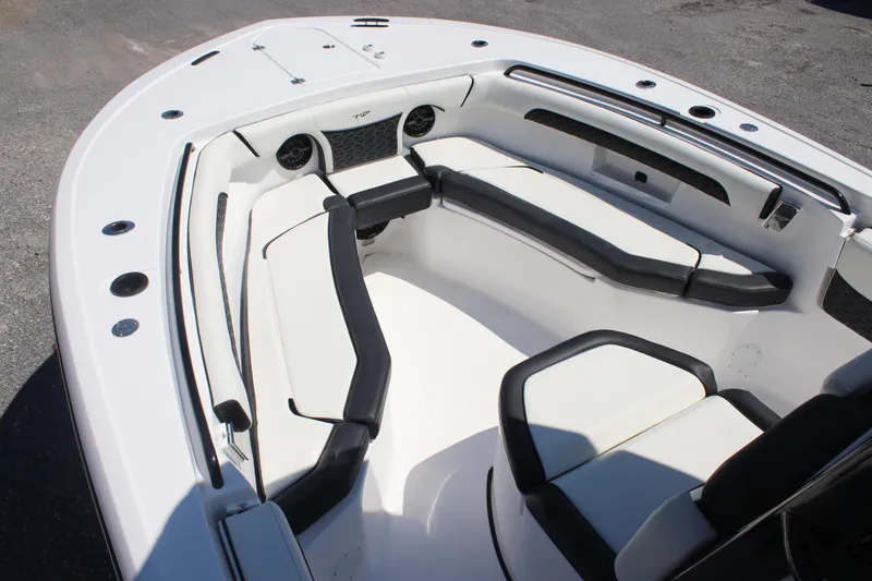Slide: The Image of 2026 Tidewater 256 CC Adventure boat interior with sleek seating and modern design. - 20