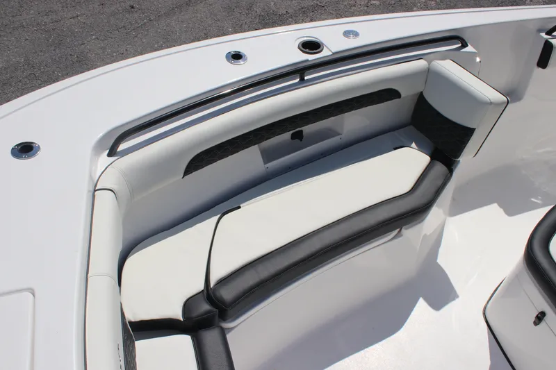 Slide: The Image of 2026 Tidewater 256 CC Adventure boat with sleek seating design. - 21