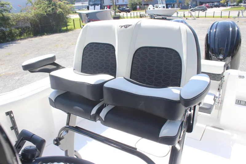 Slide: The Image of 2026 Tidewater 256 CC Adventure boat seats with armrests and stylish design. - 9