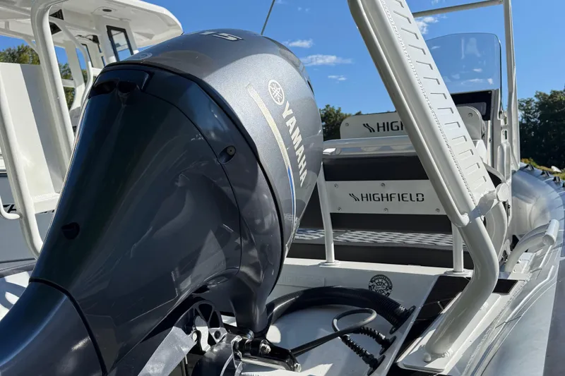 Slide: The Image of 2024 Highfield Sport 560 boat with Yamaha engine, showcasing sleek design and modern features. - 10