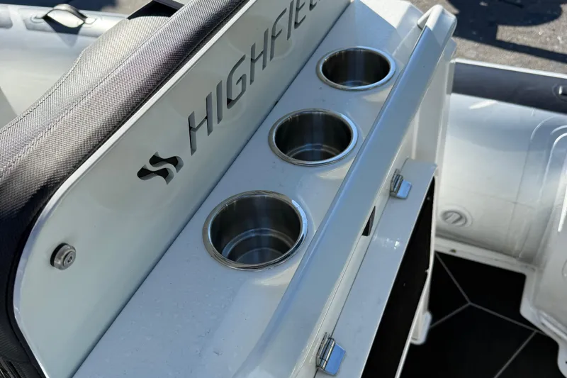 Slide: The Image of 2024 Highfield Sport 560 boat with cup holders and branded seating. - 29
