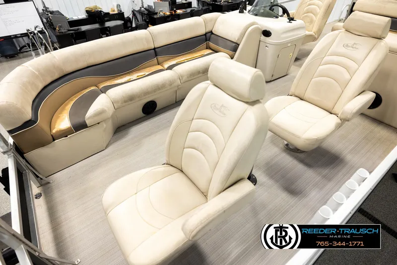 Slide: The Image of Interior of 2011 Misty Harbor 2285 CS pontoon boat with beige seating. - 10