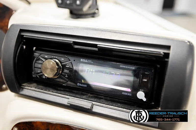 Slide: The Image of Close-up of a 2011 Misty Harbor 2285 CS boat stereo system with Bluetooth connectivity. - 31