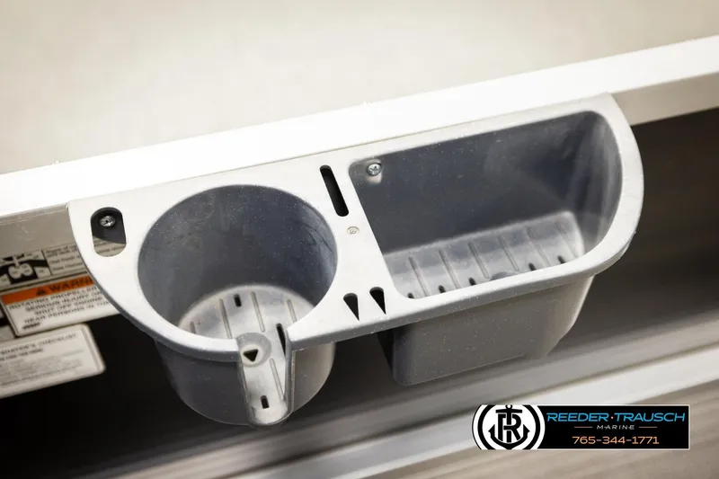 Slide: The Image of Cup holder on 2011 Misty Harbor 2285 CS boat, Reeder-Trausch Marine branding visible. - 37