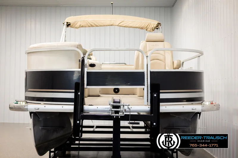 Slide: The Image of 2011 Misty Harbor 2285 CS pontoon boat in showroom, rear view. - 8