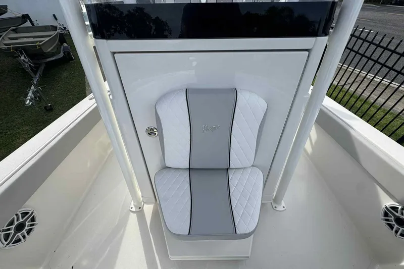 Slide: The Image of 2026 Ranger 2510 Bay boat seat with white and gray upholstery. - 8