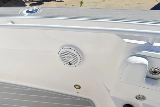 Slide: The Image of 2014 Everglades 325 Center Console boat interior with sink and toilet. - 17