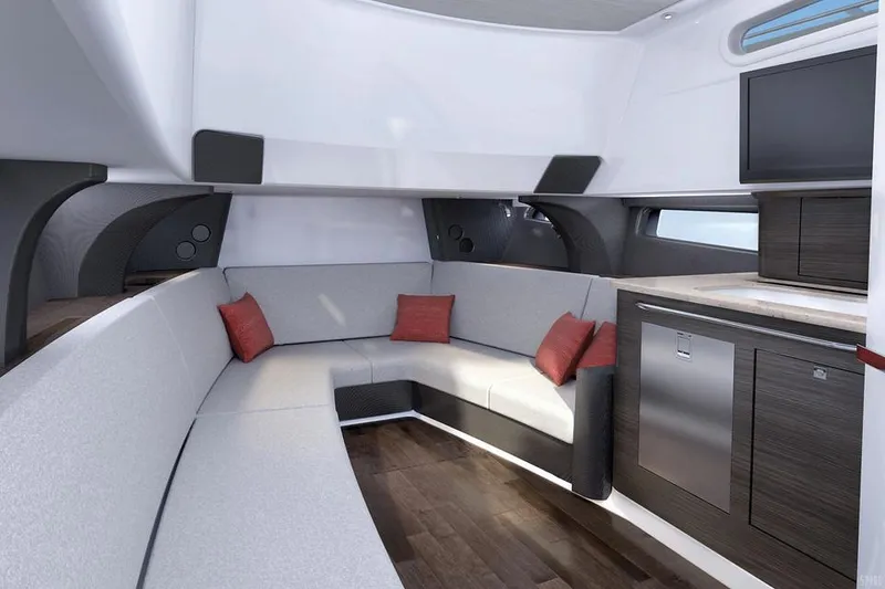 Slide: The Image of Manufacturer Provided Image: Interior of 2020 Boston Whaler 420 Outrage with modern seating and kitchenette. - 12