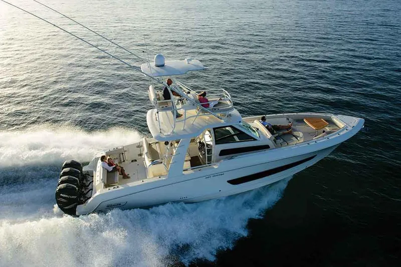 Slide: The Image of Manufacturer Provided Image: 2020 Boston Whaler 420 Outrage cruising on open water. - 2