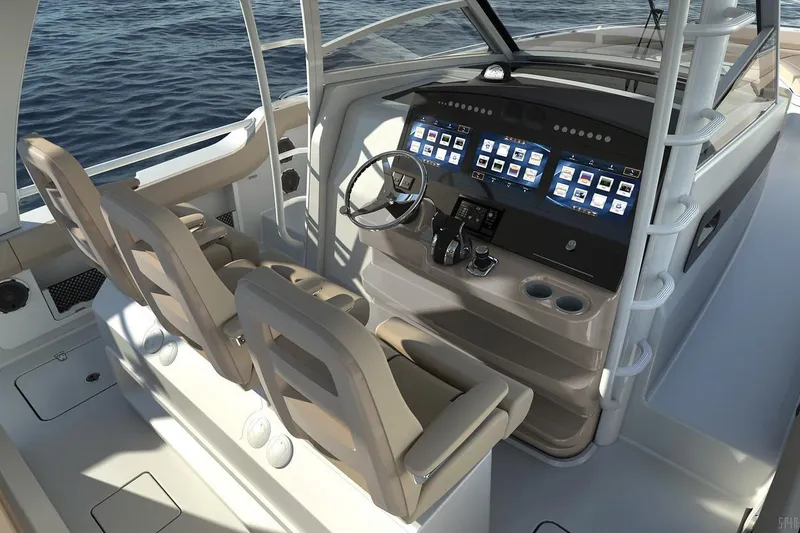 Slide: The Image of Manufacturer Provided Image: 2020 Boston Whaler 420 Outrage helm with dual seats and advanced navigation system. - 8