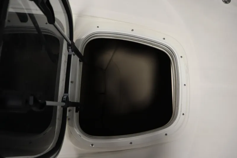 Slide: The Image of Open hatch on 2013 Sea Ray 280 Sundancer boat, showing interior compartment. - 15