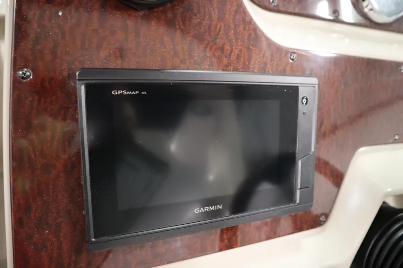 Slide: The Image of Garmin GPSMAP X5 on 2013 Sea Ray 280 Sundancer dashboard. - 25