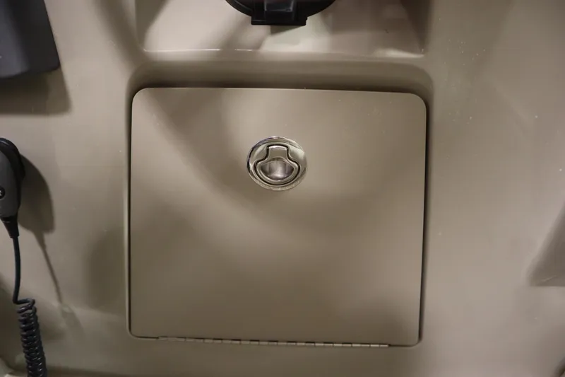 Slide: The Image of Storage compartment on a 2013 Sea Ray 280 Sundancer boat. - 31