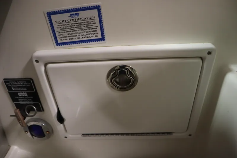 Slide: The Image of Yacht certification plaque on 2013 Sea Ray 280 Sundancer, featuring a secure hatch. - 34