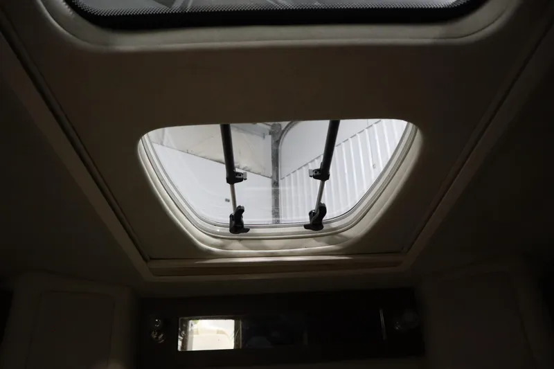 Slide: The Image of Cabin skylight of 2013 Sea Ray 280 Sundancer boat, interior view. - 43