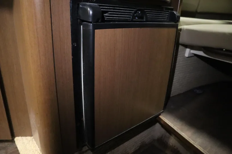 Slide: The Image of Compact refrigerator in 2013 Sea Ray 280 Sundancer cabin interior. - 52