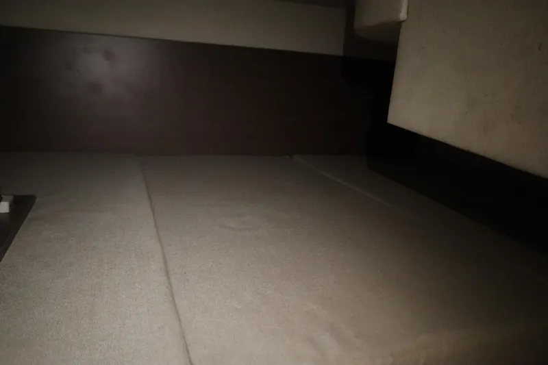 Slide: The Image of Interior cabin view of a 2013 Sea Ray 280 Sundancer boat. - 65