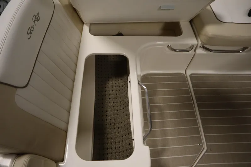 Slide: The Image of Interior seating and storage of 2013 Sea Ray 280 Sundancer boat. - 70