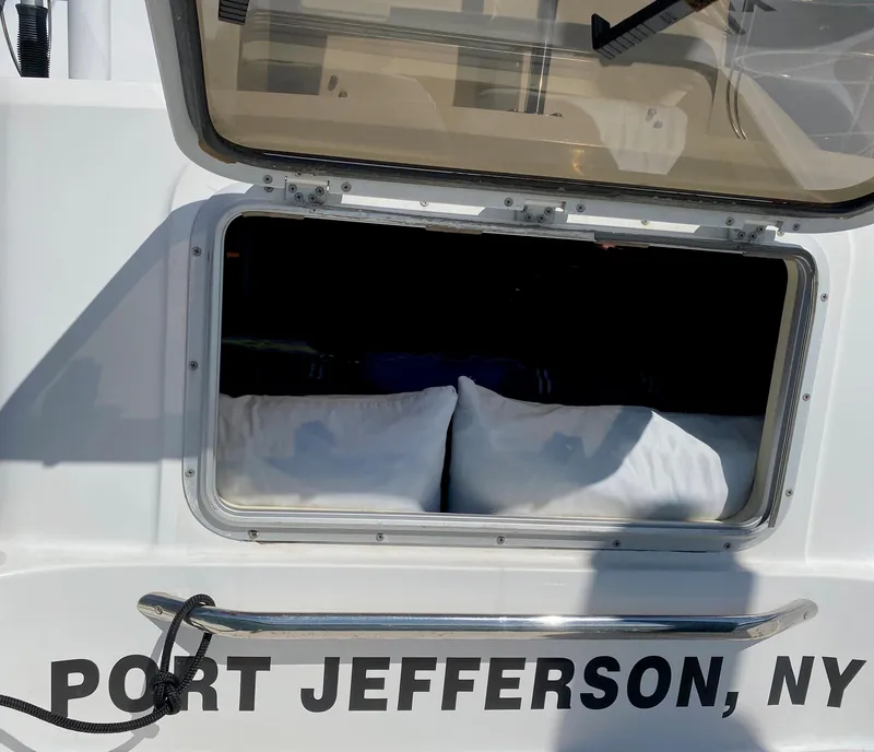 Slide: The Image of Open cabin window of 1997 Catalina Morgan 38, Port Jefferson, NY. - 26