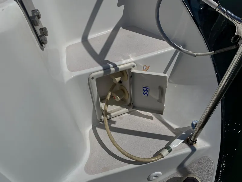 Slide: The Image of Sailboat deck with open compartment on a 1997 Catalina Morgan 38. - 29