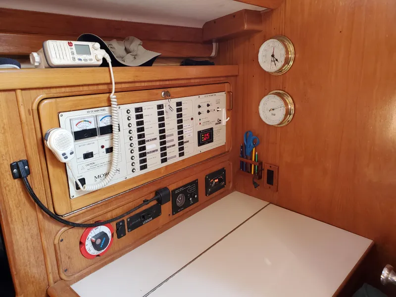 Slide: The Image of Control panel of a 1997 Catalina Morgan 38 sailboat with navigation instruments. - 39