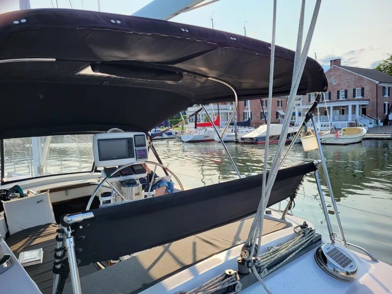 Slide: The Image of Sailboat cockpit view, Catalina Morgan 38, 1997, docked near waterfront buildings. - 8