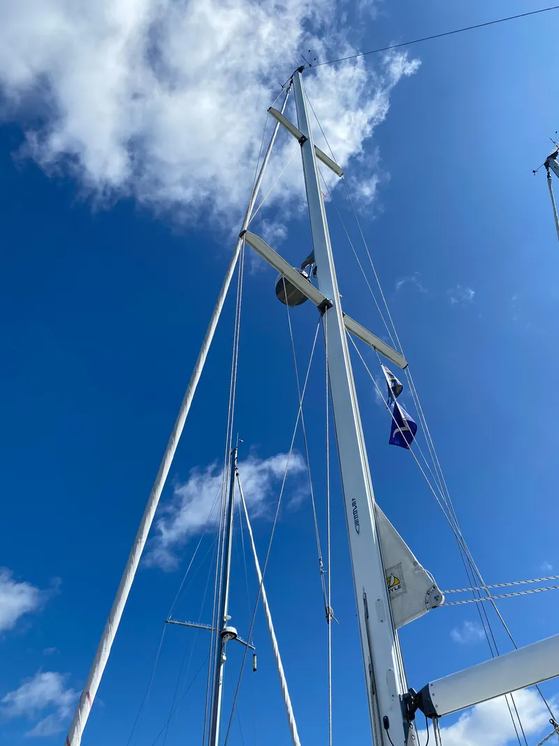 Slide: The Image of Sailboat mast of 1997 Catalina Morgan 38 against a clear blue sky. - 9