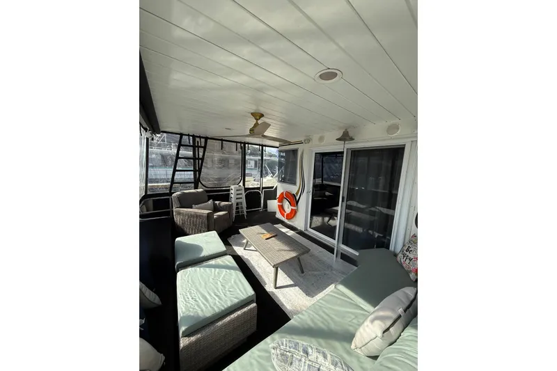 Slide: The Image of Spacious 2003 Horizon houseboat interior with cozy seating and modern decor. - 3