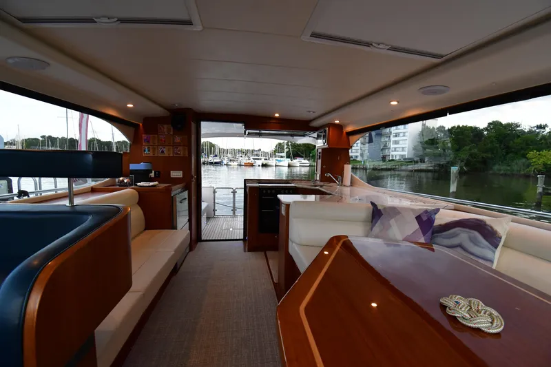 Slide: The Image of Luxurious interior of 2021 Hylas M44 yacht with marina view. - 13