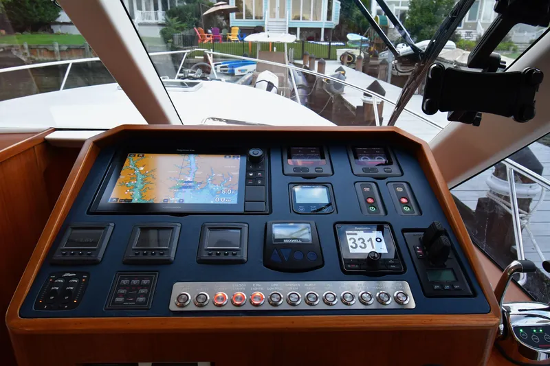 Slide: The Image of Control panel of a 2021 Hylas M44 yacht with navigation and monitoring systems. - 7