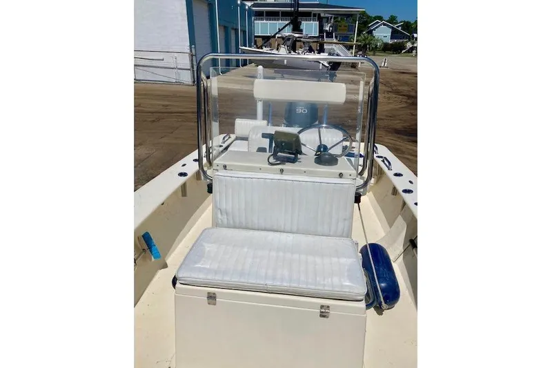 Slide: The Image of 2007 Jones Brothers 200 Bateau boat interior with steering console and cushioned seating. - 6