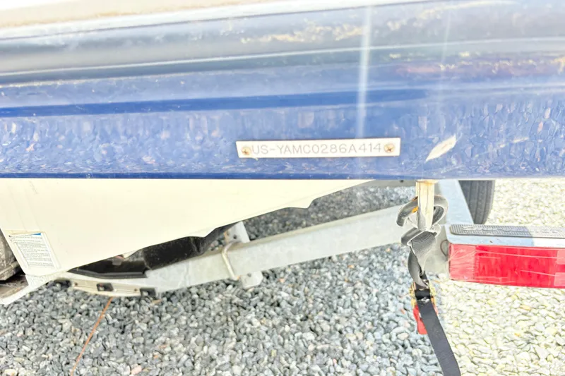 Slide: The Image of 2014 Yamaha SX190 boat hull with visible identification number plate. - 11