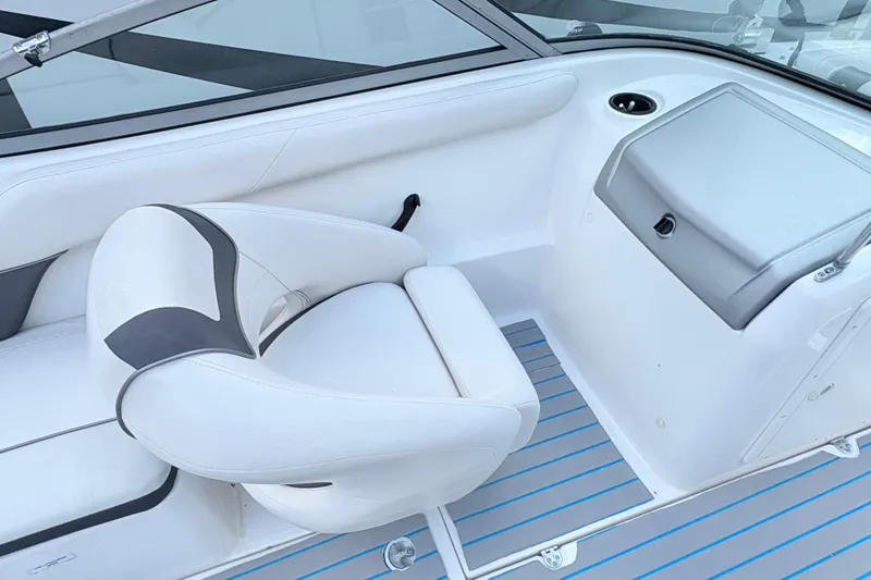 Slide: The Image of 2014 Yamaha SX190 boat interior with white seating and gray accents. - 19