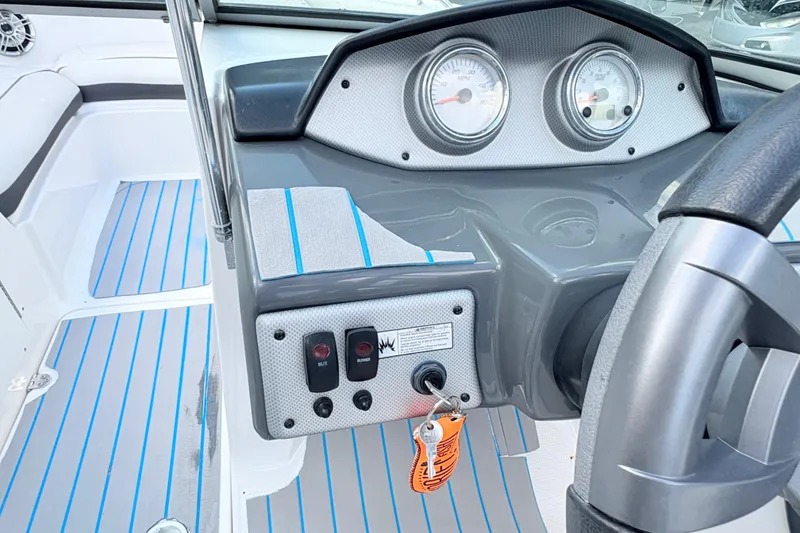 Slide: The Image of 2014 Yamaha SX190 boat dashboard with gauges and controls. - 26