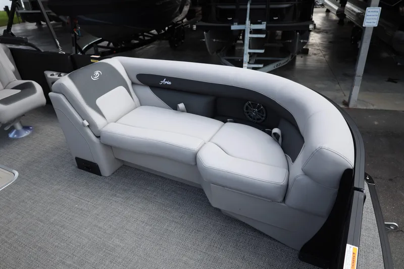 Slide: The Image of Luxurious seating on 2026 Barletta ARIA 22QC pontoon boat, featuring sleek gray upholstery. - 10