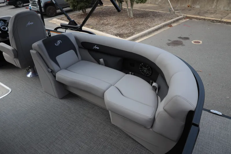 Slide: The Image of Luxurious seating on 2026 Barletta ARIA 22QC pontoon boat, featuring sleek gray upholstery. - 13