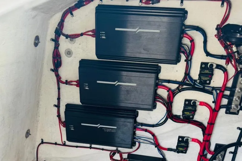 Slide: The Image of Electrical wiring and components inside a 2005 Carrera Boats 32 model. - 7