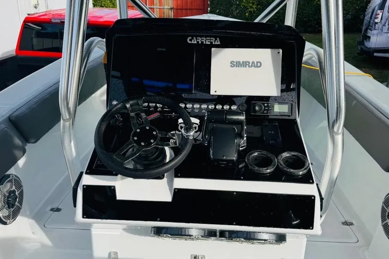 Slide: The Image of Live bait well on a 2005 Carrera Boats 32, filled with fish. - 5