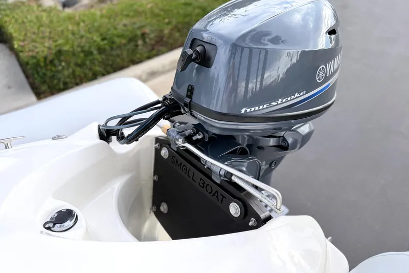 Slide: The Image of 2003 Zodiac Yachtline 340DL with Yamaha four-stroke outboard motor. - 8