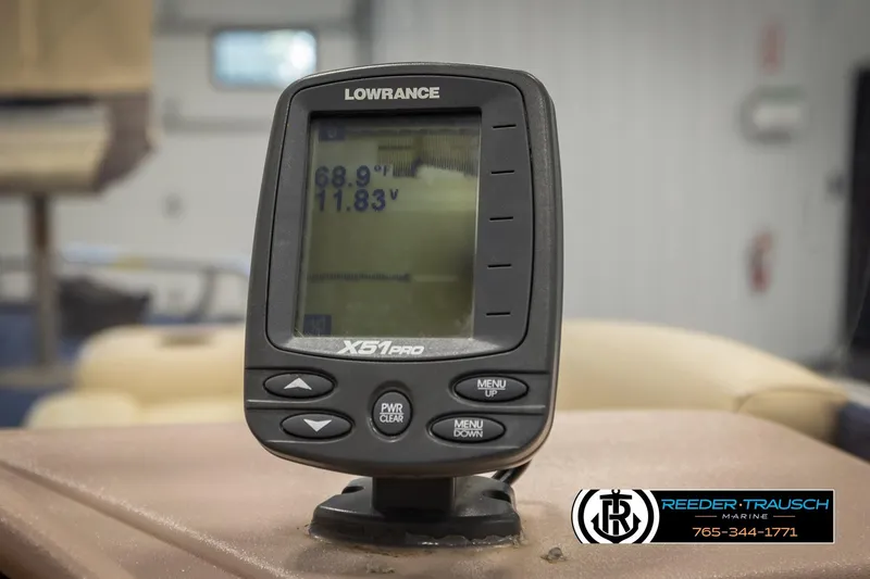 Slide: The Image of Fishfinder display on a 1998 Lowe LS 2220 boat, showing temperature and voltage readings. - 29
