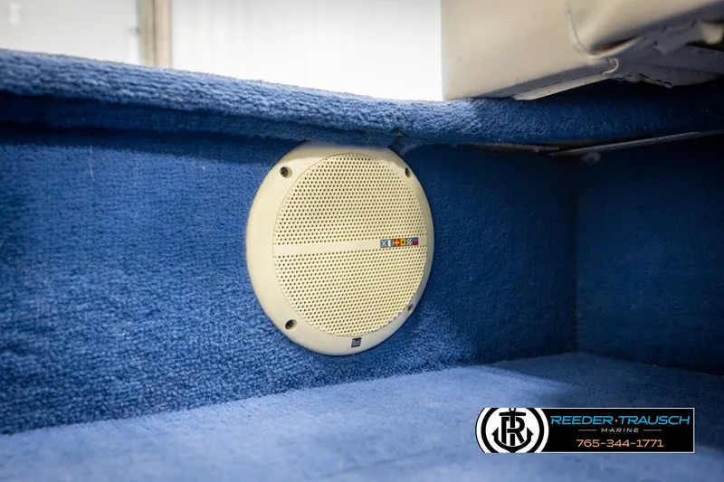 Slide: The Image of Speaker installed in a 1998 Lowe LS 2220 boat with blue carpet interior. - 36