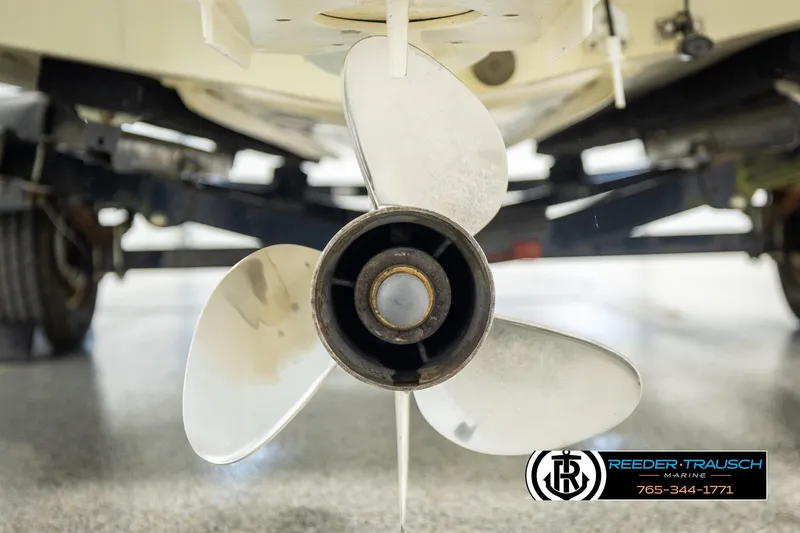 Slide: The Image of Close-up of a 1998 Lowe LS 2220 boat propeller on a trailer. - 46