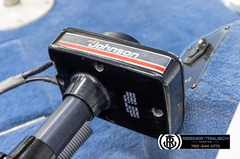 Slide: The Image of Close-up of a Johnson boat motor part on a 1998 Lowe LS 2220. - 52