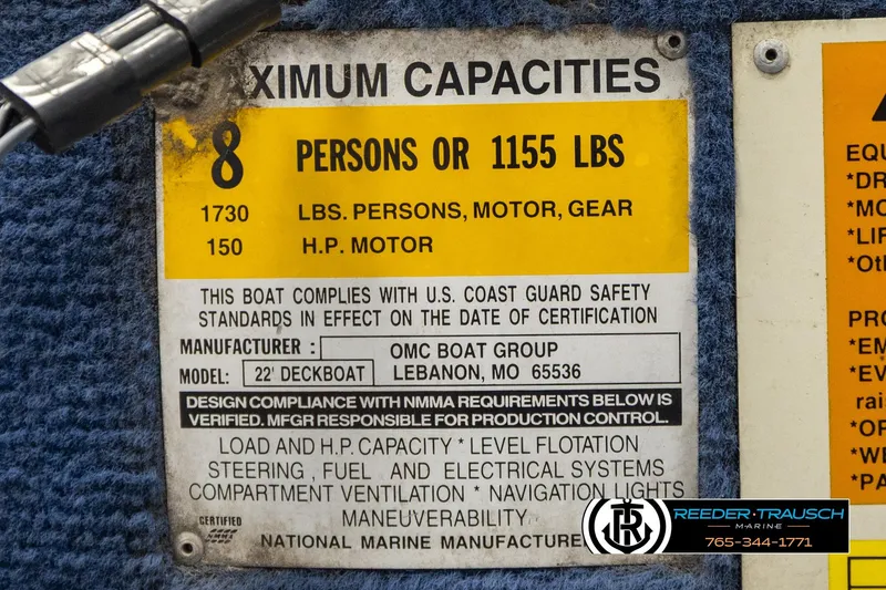 Slide: The Image of Capacity label for Lowe LS 2220 boat, 1998 model, showing maximum 8 persons or 1155 lbs. - 55