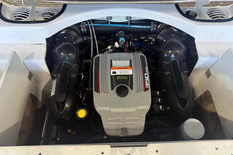 Slide: The Image of 2011 FOURWINNS 210 boat engine compartment with MerCruiser 350 MAG engine. - 7